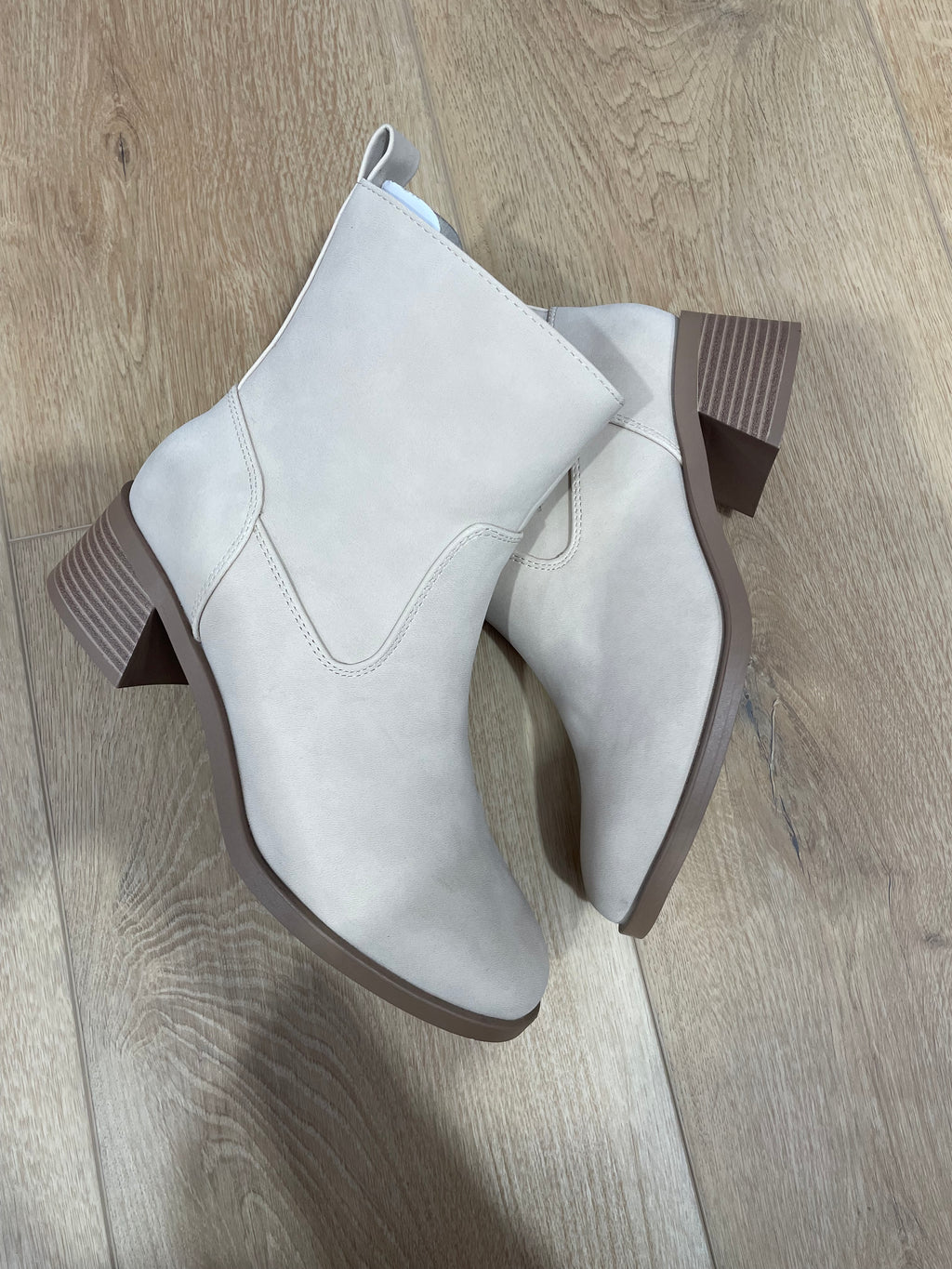 Beige low heel ankle boot