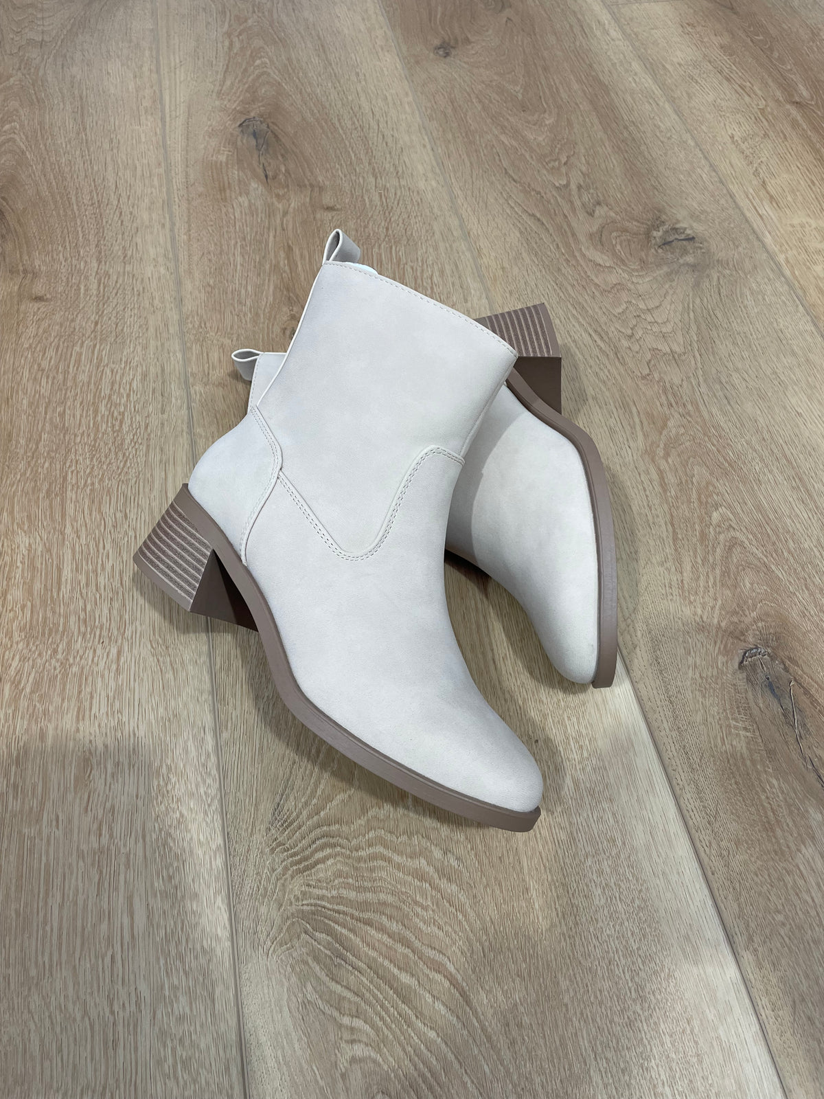 Beige low heel ankle boot