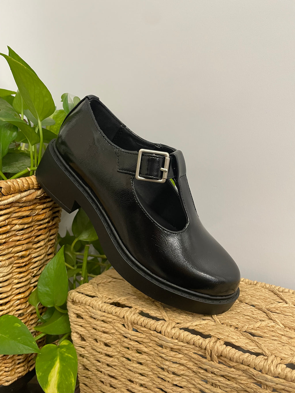 Silver buckle dress shoe